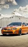 pic for Orange Pontiac GTO In Port Ship 768x1280